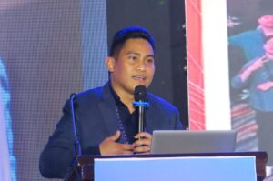 Jervie Lazaro OutSystems Lead Solution Architect keynote at the National ICT Summit 2026 Caption: Mr. Jervie Lazaro, Lead Solution Architect of OutSystems, delivers Keynote Presentation 2 at the National ICT Summit 2026.
